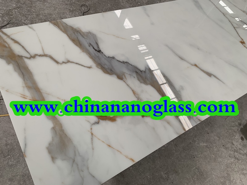 <a href='https://www.chinananoglass.com/nanoglass/nanoglass-slab/calacatta-nanoglass'>Nano Calacatta</a> white is Nano Crystallized Glass marble look slabs from China